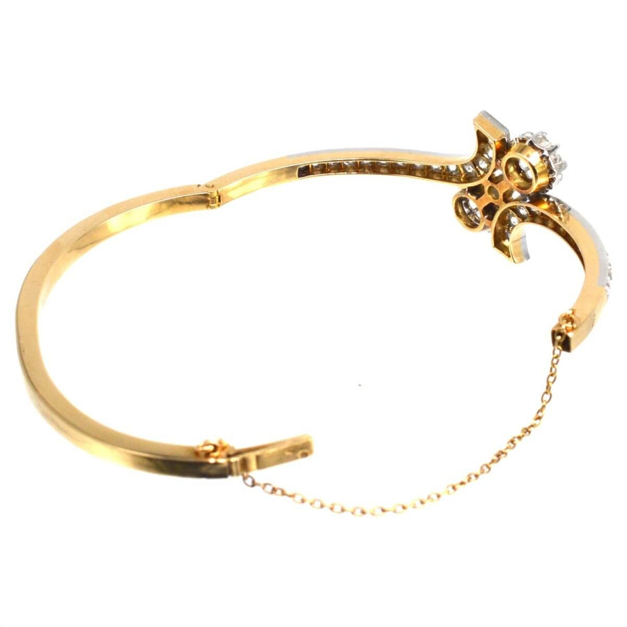 Vintage French 18ct gold and platinum Toi et Moi diamond bangle, showcasing exquisite craftsmanship and elegance.