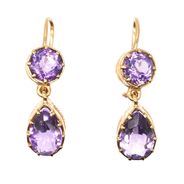 Vintage 9ct gold drop earrings featuring royal purple amethyst stones in a delicate design.